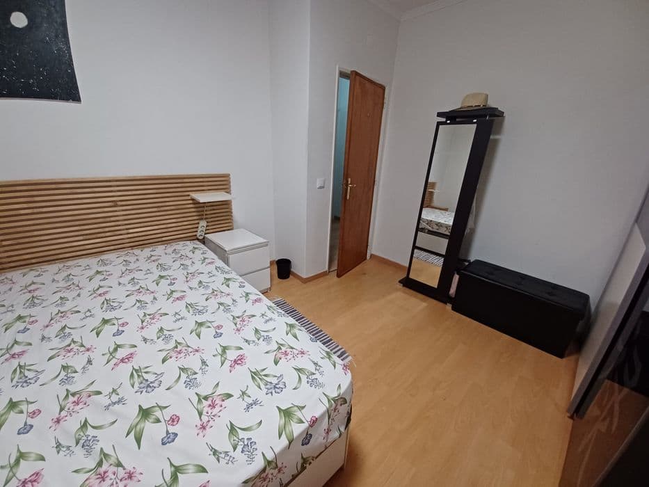 Quarto com varanda em moradia