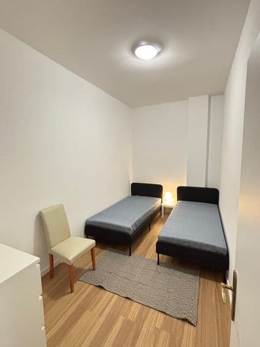 Cama em quarto partilhado em Monte Abraão